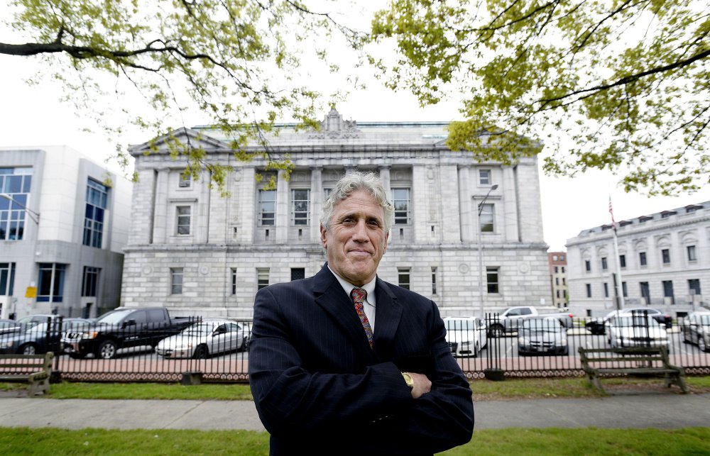 Gary Prolman, defense attorney, in front of Court House